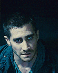 Movie gif. Jake Gyllenhaal as Colter Stevens in Source Code looks up slowly, breathing in a big slow breath. He has a fearful yet determined look in his eye.