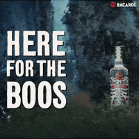 Sponsored gif. A zombie hand holding a knife emerges from a grave next to a Halloween-themed bottle of Bacardi. Text: "HERE FOR THE BOOS"