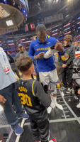Draymond Gifts Shoes To Young Fan