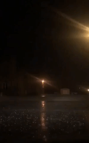 Lightning Flashes and Hail Falls During Oklahoma Storm