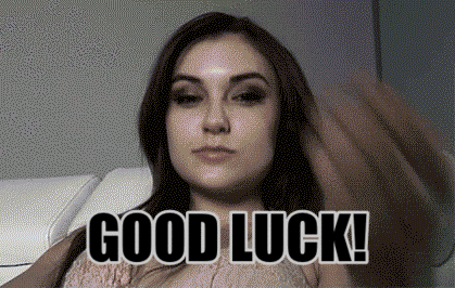 Celebrity gif. Sasha Grey looks down at us with smoky eyes and blows us a kiss with a smirk on her face. Text, “Good Luck!”