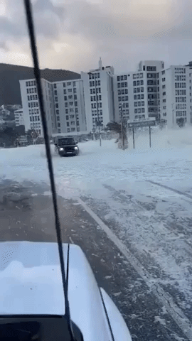 Strong Winds Blow Sea Foam Across Cape Town Street Amid 'Intense' Cold Front