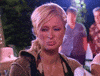 TV gif. Paris Hilton looks lower left of frame and is clearly disgusted by what she sees.