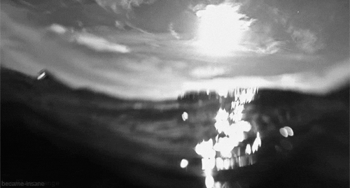 drowning black and white GIF