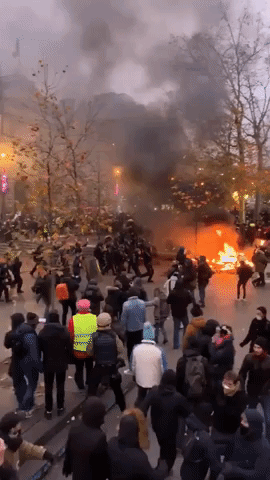 Fires Burn in Central Paris as Pension Protests Bring France to a Standstill