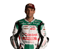 Sticker gif. Johann Zarco in his branded uniform and a Red Bull cap, raising his arms above his head in celebration, saying, 'Yeeeeeeees!'