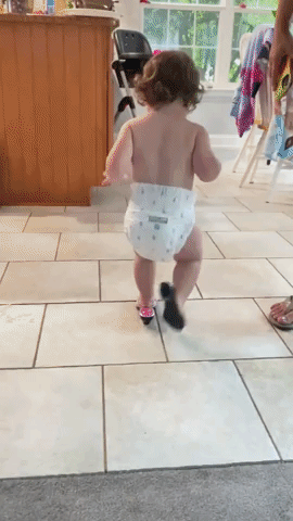 Toddler Struts Her Stuff in Plastic Heels
