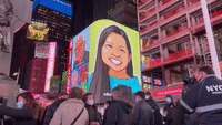 Crowds Gather in Times Square to Honor Michelle Go After Deadly Subway Push