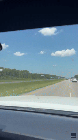 Motorists Stunned as Plane Lands on Busy Highway