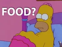 The Simpsons gif. Homer lays in bed without a shirt on. He looks down at his stomach which is grumbling in hunger, basically rippling like waves. Text, “Food?”