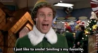 Movie gif. Will Ferrell as Buddy in 