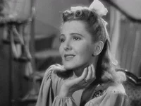 Amused Jean Arthur GIF