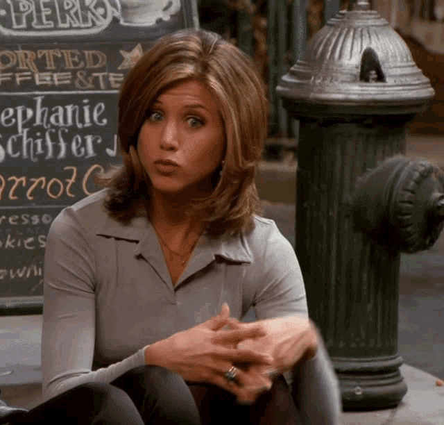 Rachel Green from Friends saying “woosh” and throwing her hand over her head
