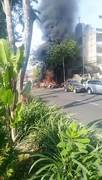Fire Erupts Near Surabaya Church Blast Sites