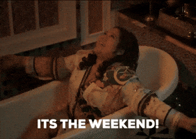 Video gif. A woman throws a pile of papers into the air in celebration. Text, “It’s the weekend!”