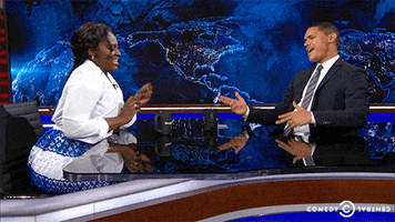 Happy Orange Is The New Black GIF by The Daily Show with Trevor Noah