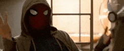 Movie gif. Wearing a hoodie and no gloves, a confused Spider-Man turns up his hands, then slumps over into a facepalm.
