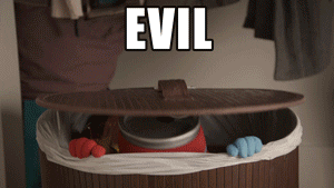 Video gif. Puppet El Capitan the aluminum can pops out of a trash can with an evil expression on his face. Text, "Evil"