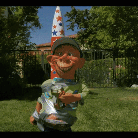 blowing up 4th of july GIF