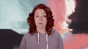 Video gif. Woman nods with an uncertain expression as she shrugs subtly in front of a watercolor backdrop.