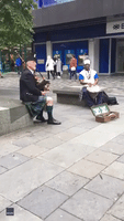 Buskers Delight Passerby With Cross-Cultural Performance in Scotland