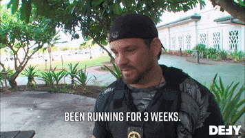 Reality TV gif. A character Dog the Bounty Hunter is being interviewed and he says, "Been running for three weeks."
