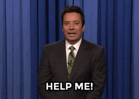 Tonight Show gif. In front of a blue curtain, Jimmy speaks to us stiffly with a blank stare. Text, "Help me!"