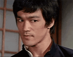 Bruce Lee Smirk GIF