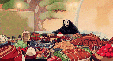Anime gif. No-Face in Spirited Away raises their arms in blessing over an enormous, magical feast.