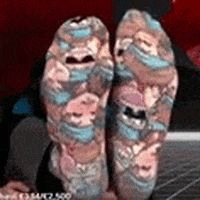 UrbanBravo twitch feet socks content creator GIF