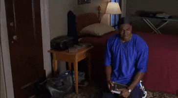Movie gif. Morris Chestnut as Lance in "The Best Man" kneels down in a bedroom, holding a bible and looking up in anguish and desperation. Text, "Lord..."