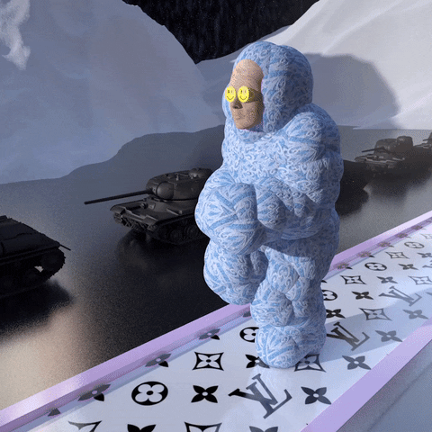 Video art gif. Person wearing a puffy sky-blue body suit and smiley-face sunglasses runs on a treadmill track decorated with the Louis Vuitton logo pattern. Behind him, a line of army tanks roll past snow-covered mountains.
